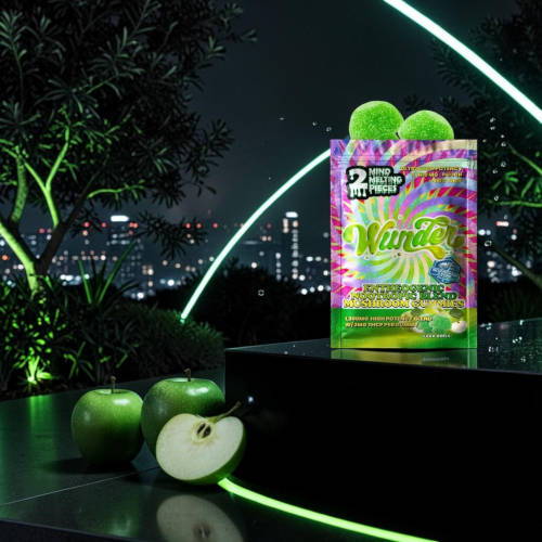 Green apples with a colorful packaging in a night city backdrop.
