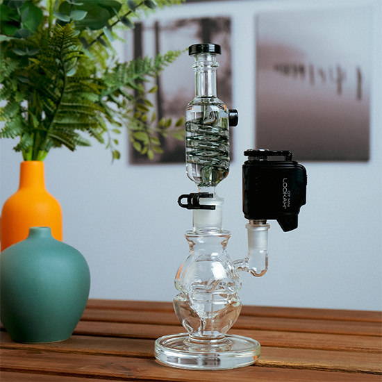 A glass dab rig with an attached e-nail