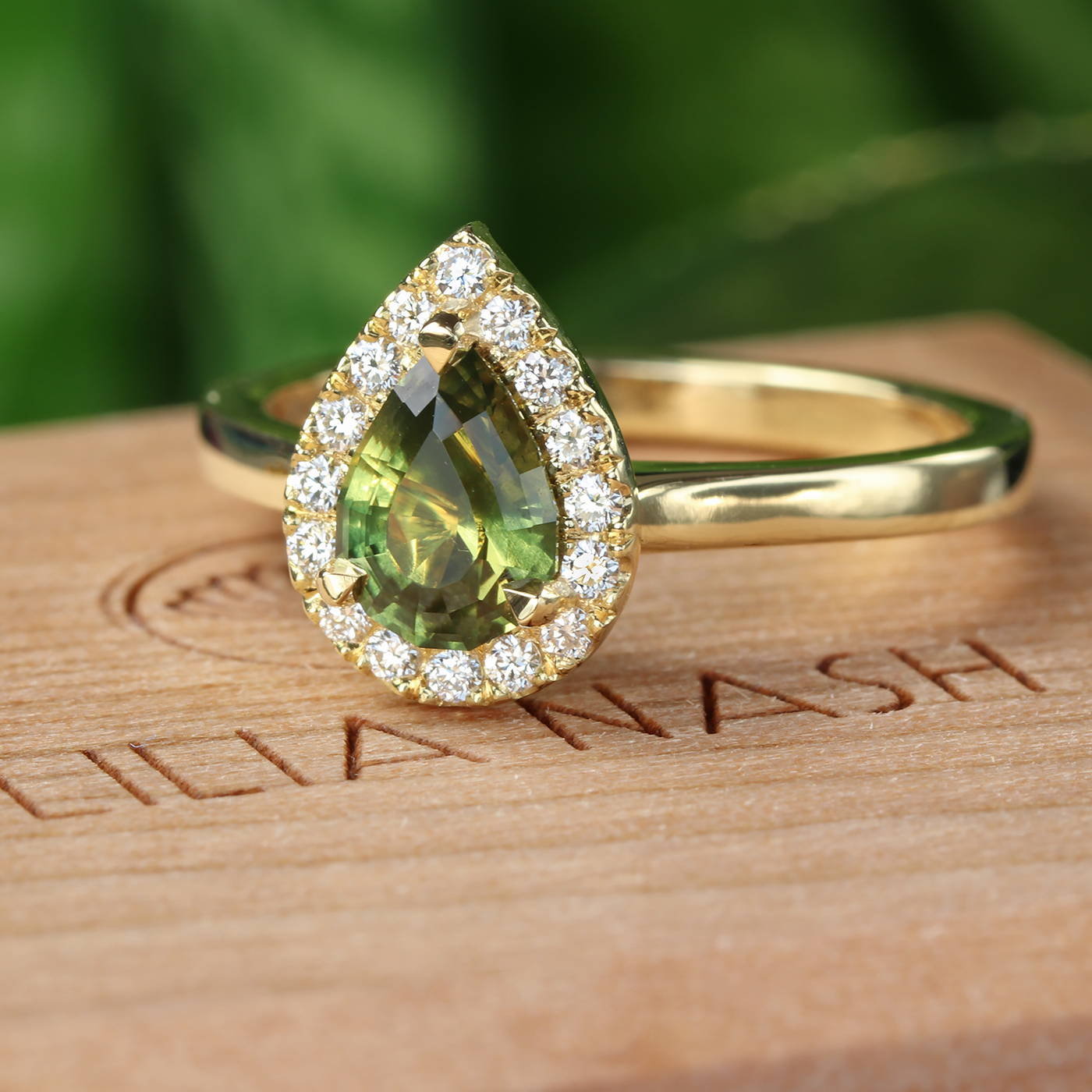 Green Sapphire and Diamond Halo Engagement Ring