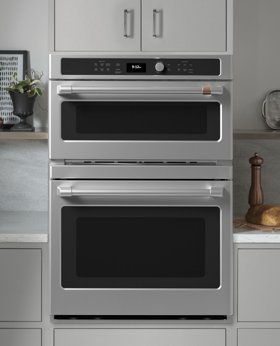 Stainless steel double oven built into modern kitchen cabinetry.