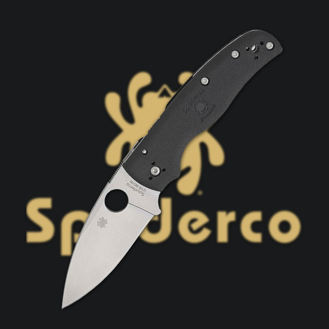 A folding knife with a stainless steel blade and black handle.