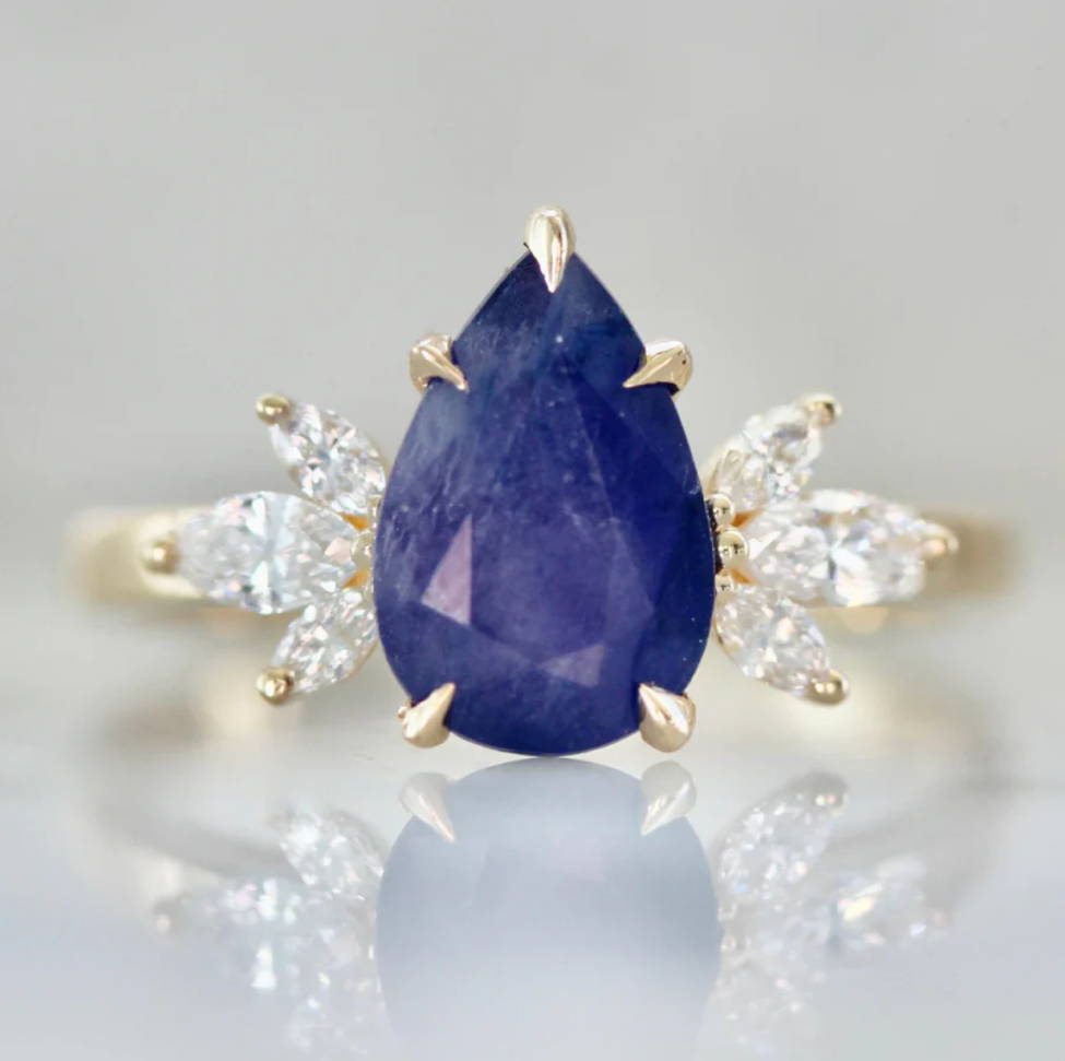 purple pear cut sapphire ring gem breakfast