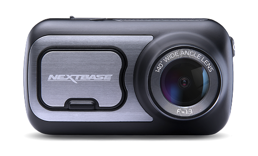 A compact Nextbase dash cam with a lens and button.