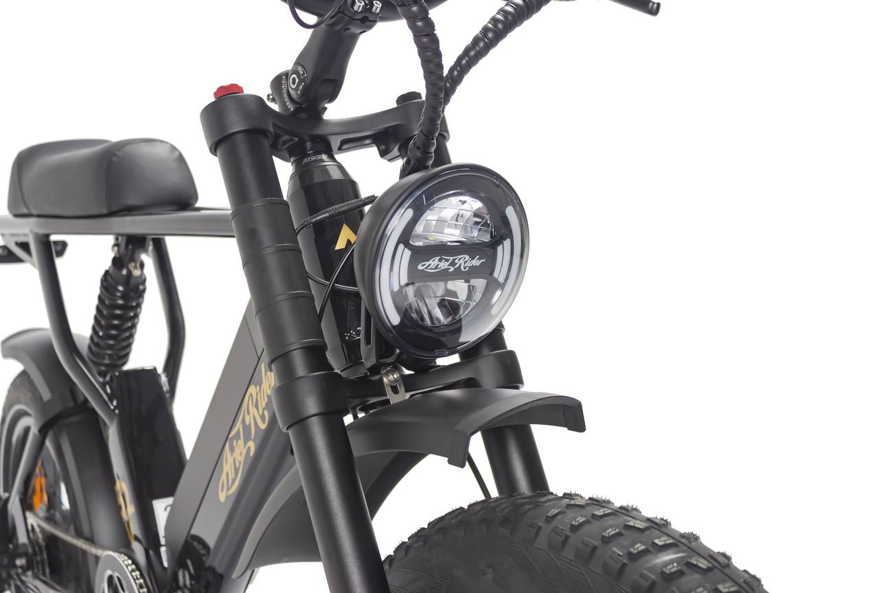 X-Class 52V Ebike equipped with a front light that has running daylight function