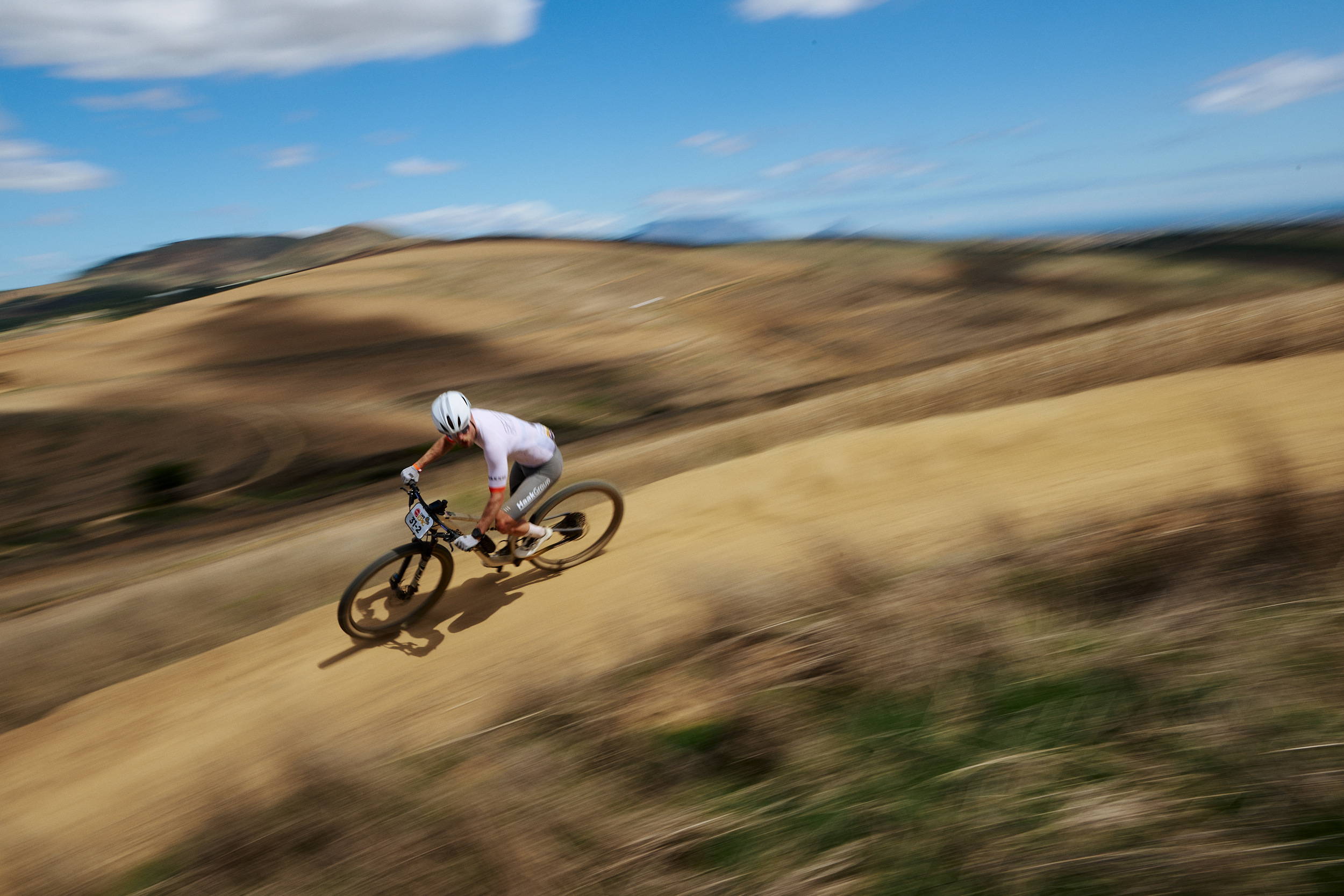 Cyclist riding a berm