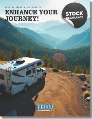An RV parked on a scenic mountain road with text overlay.