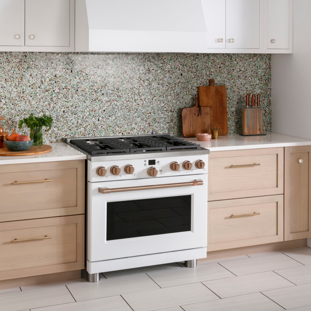 CAFE professional-style range in light, airy kitchen