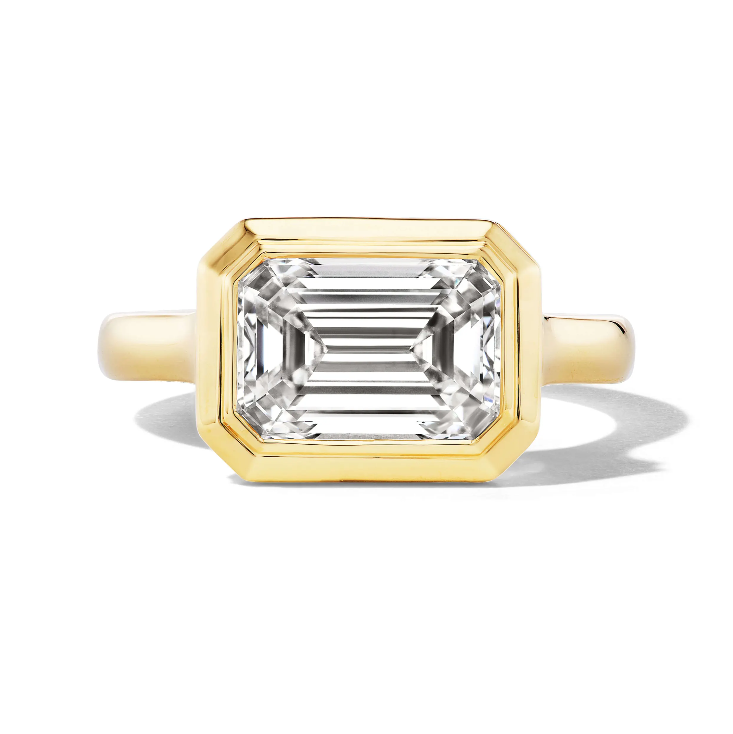 one of a kind east west emerald cut diamond engagement ring