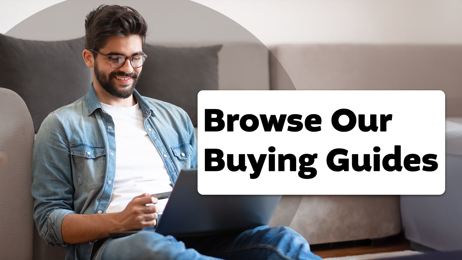 Person sitting with laptop, smiling, with text 