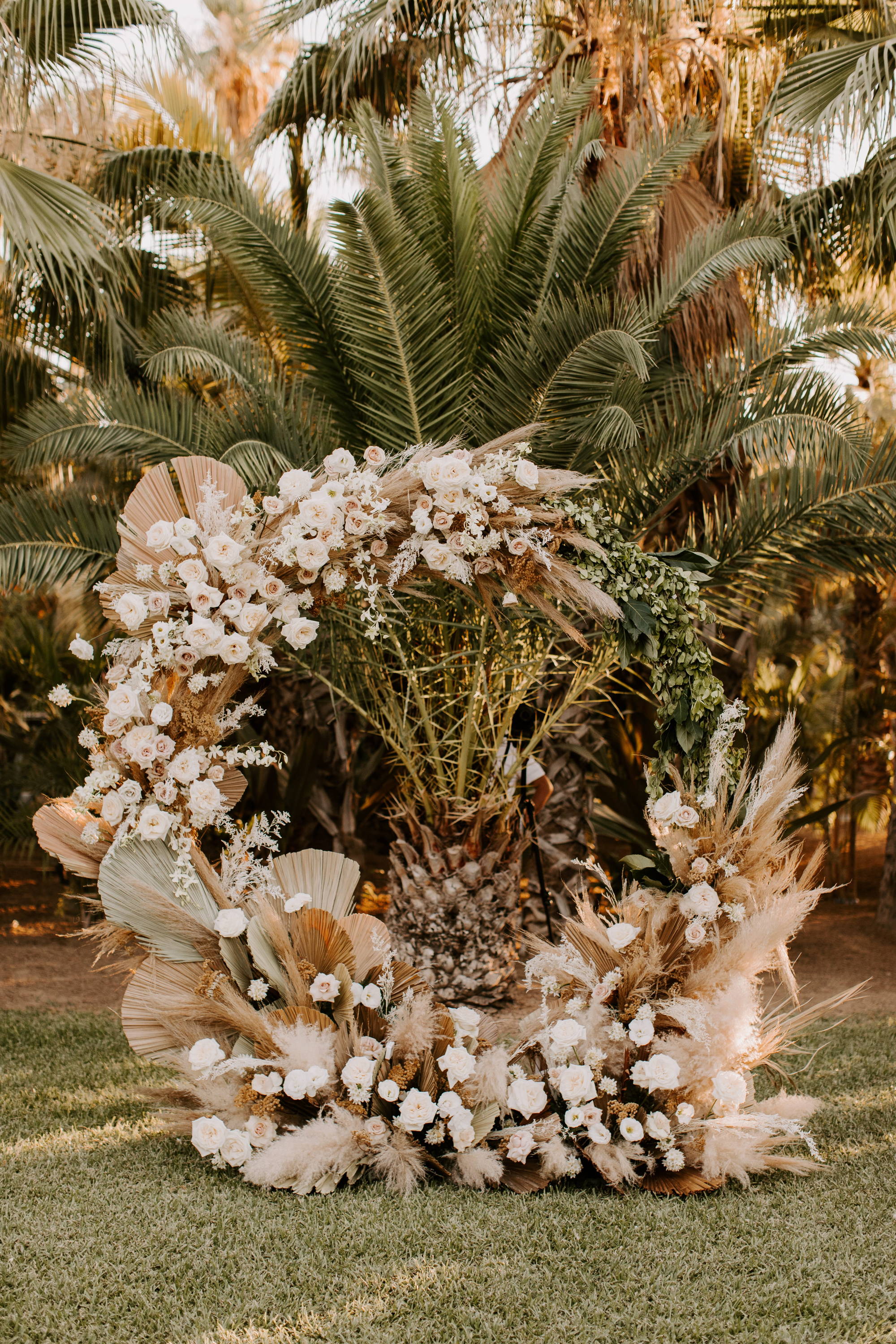 Floral arbor with palms