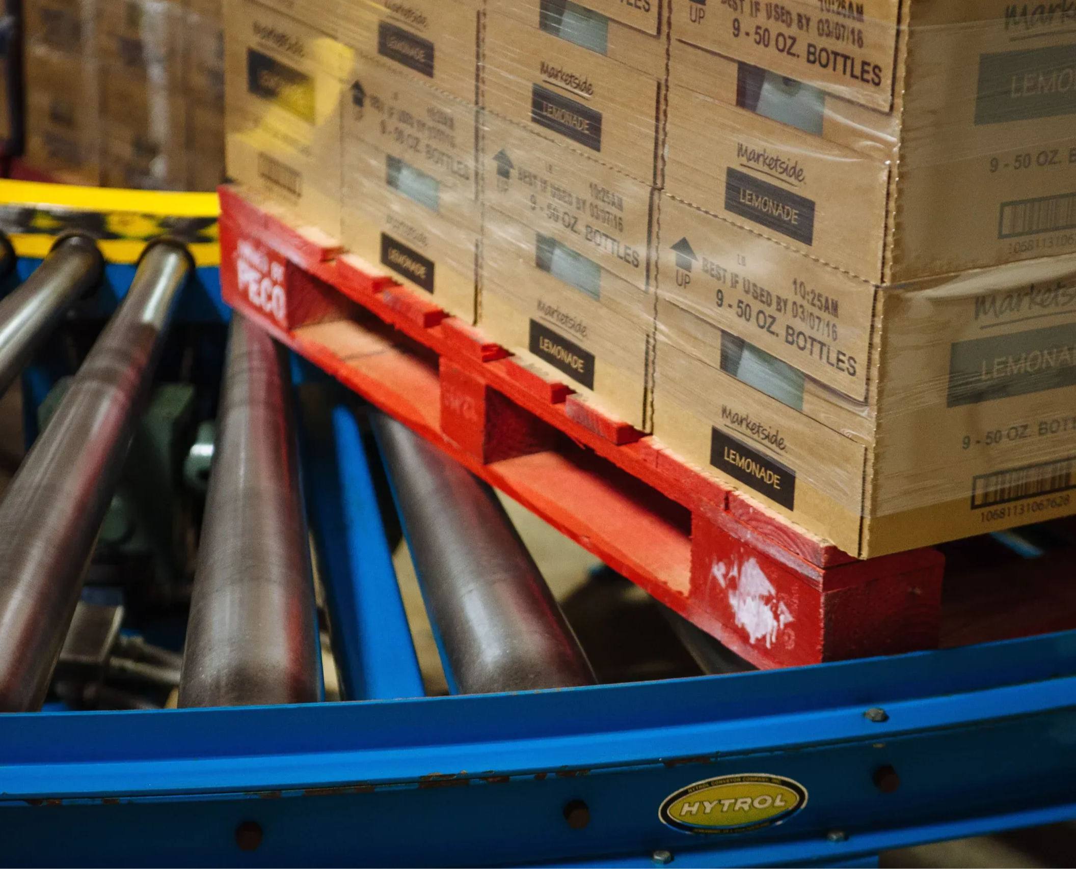Pallet Conveyor carrying fully loaded pallet