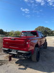 Chris's red 2022 Chevy Silverado rear three-quarter view thumbnail