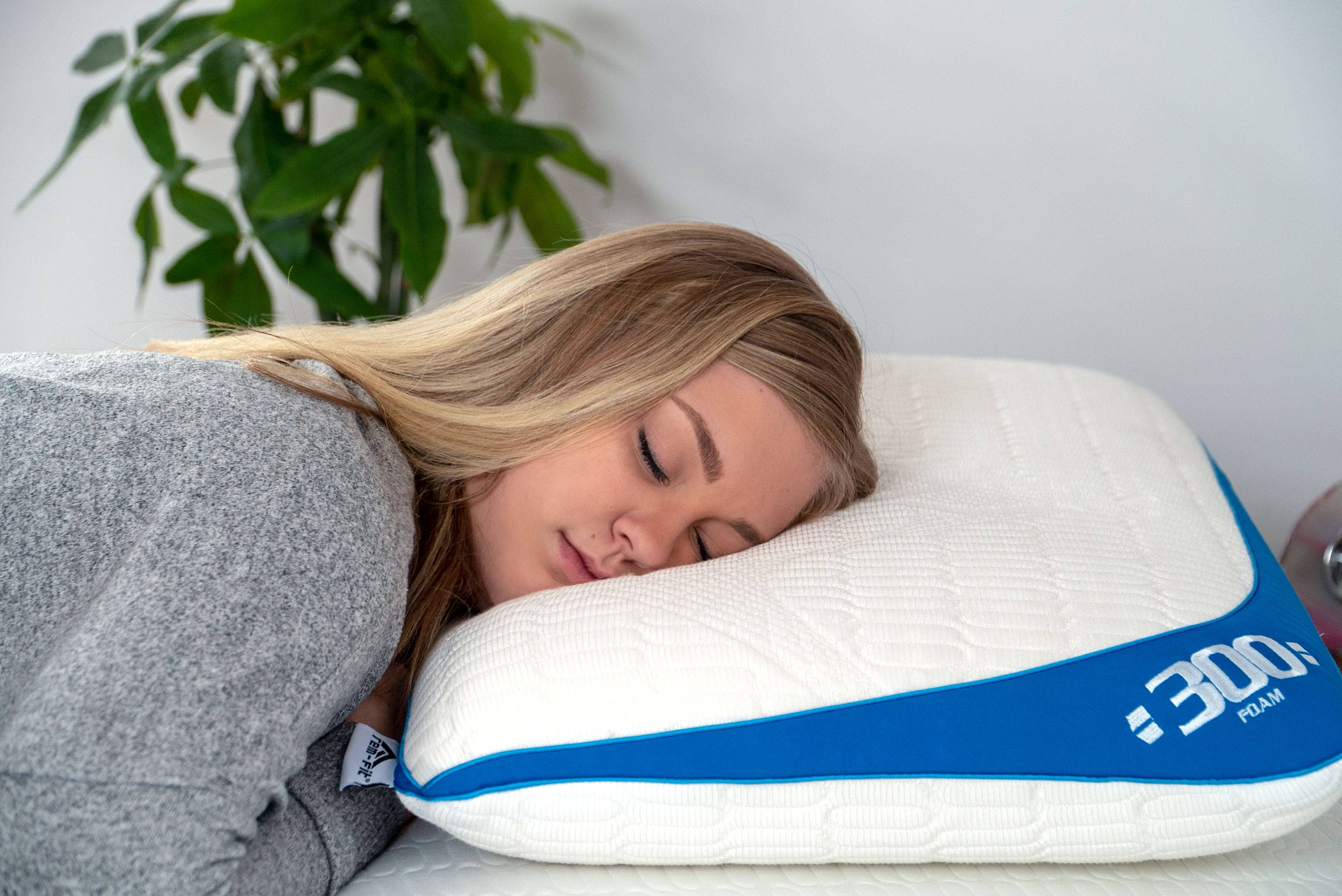 What Type of Mattress is Best for Me?. woman sleeping on stomach on 300 cooling pillow