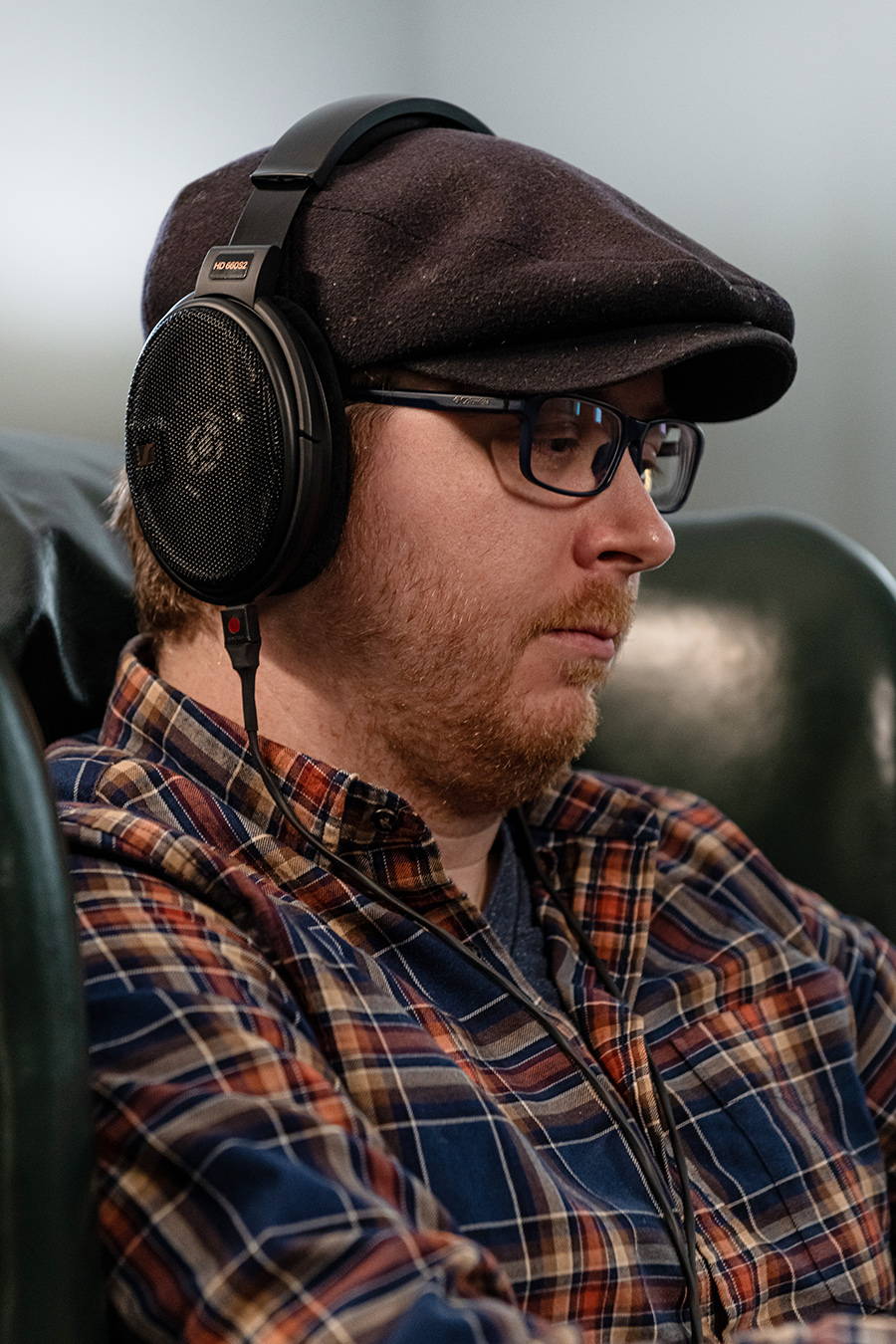 Man wearing Sennheiser HD 660S2 headphones and a Silver Dragon Headphone Cable