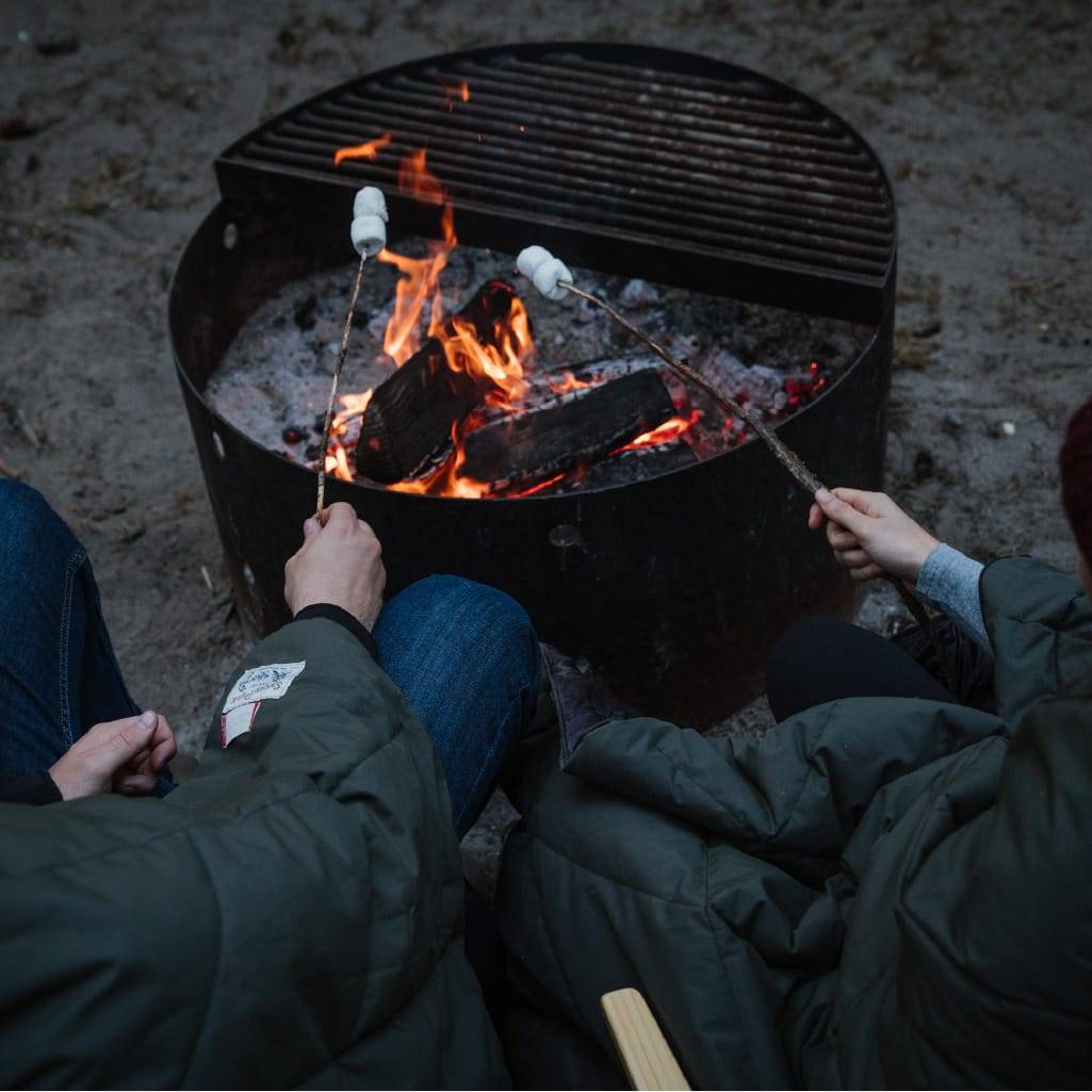 Roasting marshmallows over a fire