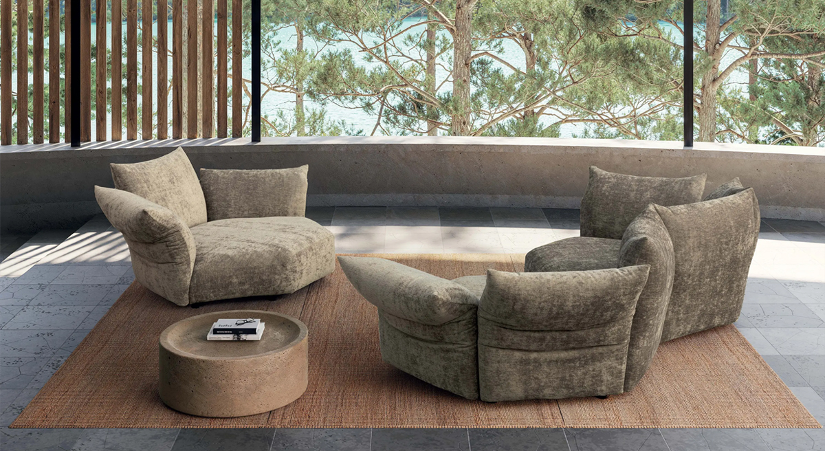 Cozy Edra Outdoor seating arrangement with two standard sofas and a round table in a modern setting.