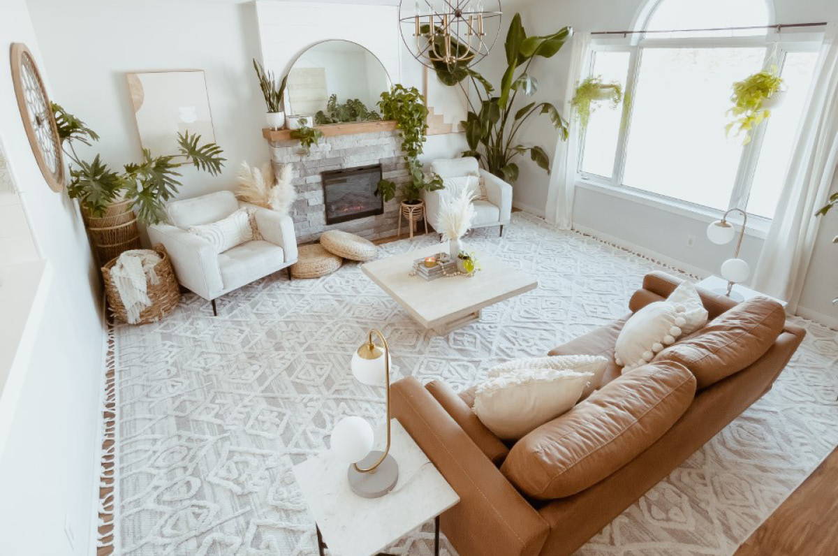 Living room decorated in boho style with neutral furniture and accessories from Dufresne.