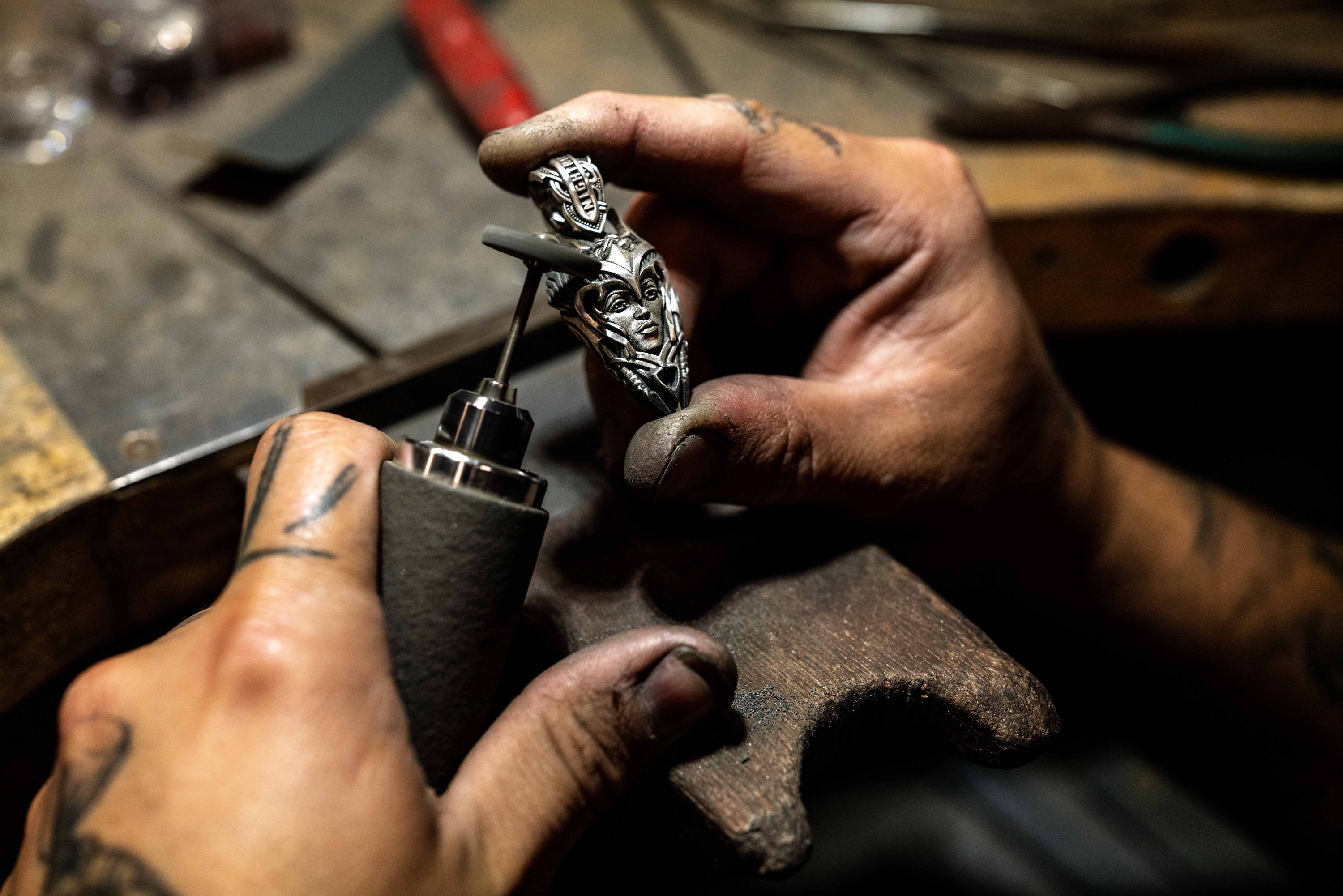 A NightRider Jewelry Master Craftsman making the Valkyria Pendant
