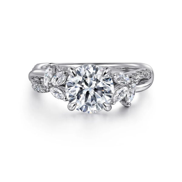 A sparkling engagement ring with a central diamond and intricate band design.
