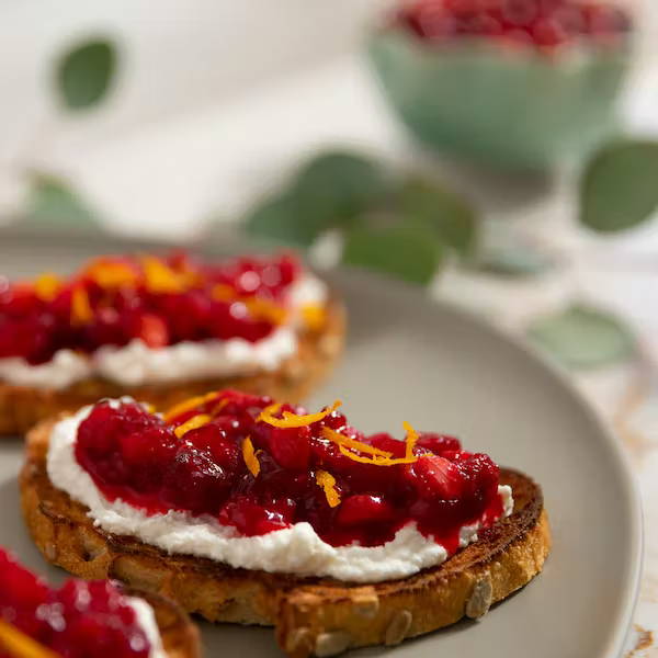 closeup finished cranberry chevre crostini