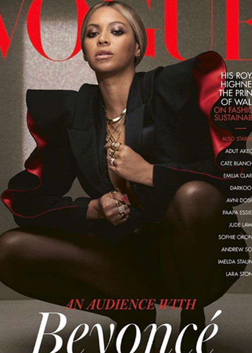 Beyoncé on the cover of Vogue magazine, wearing a stylish black outfit.