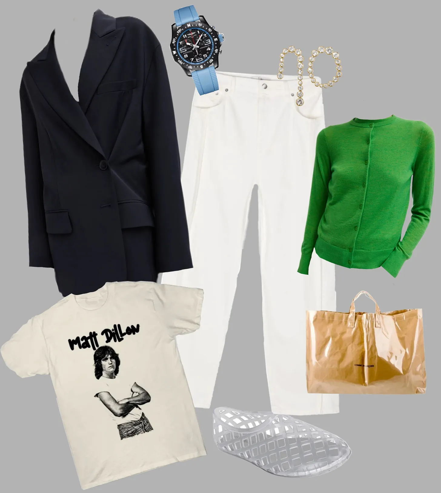 A collection of clothing items and accessories arranged artistically on a gray background.