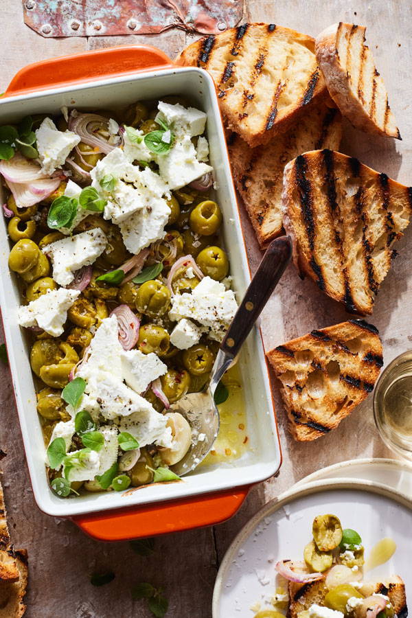 Roasted olives and shallots with Feta cheese and grilled crispy bread