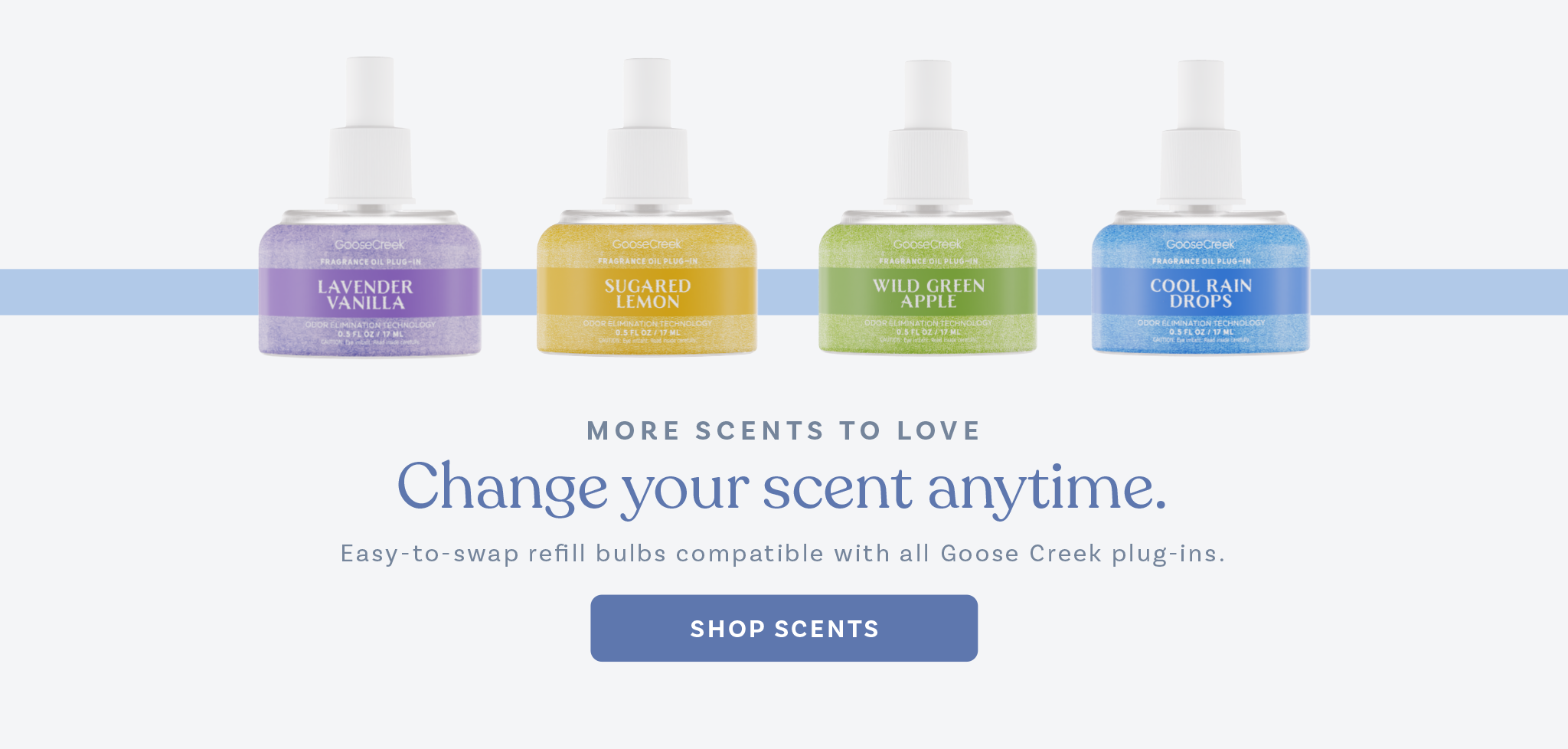Four colorful bottles with droppers on a blue background.