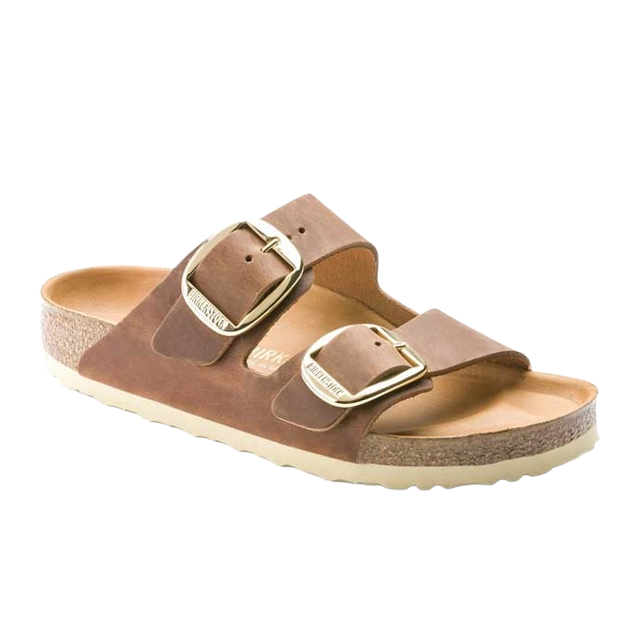 Brown sandals with two buckles and a cork sole.