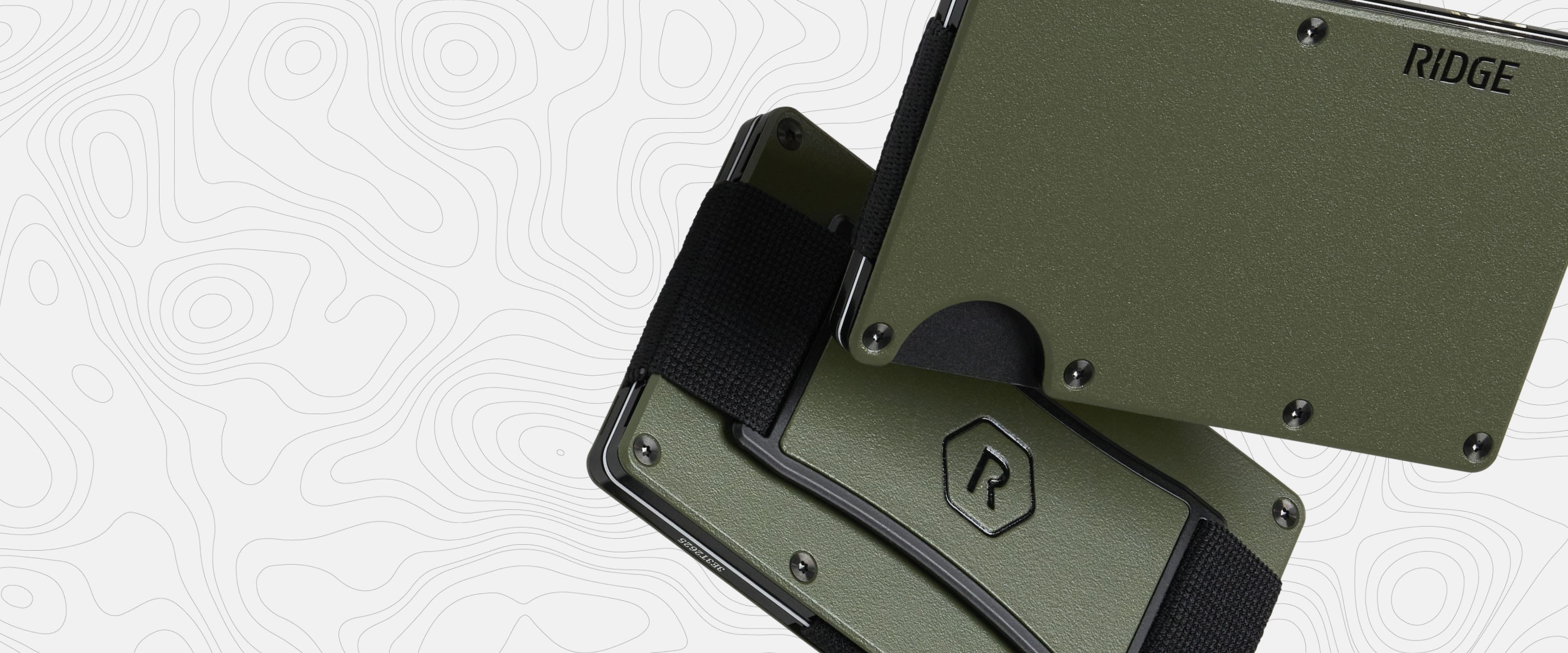 Two green wallets stacked against a white background.