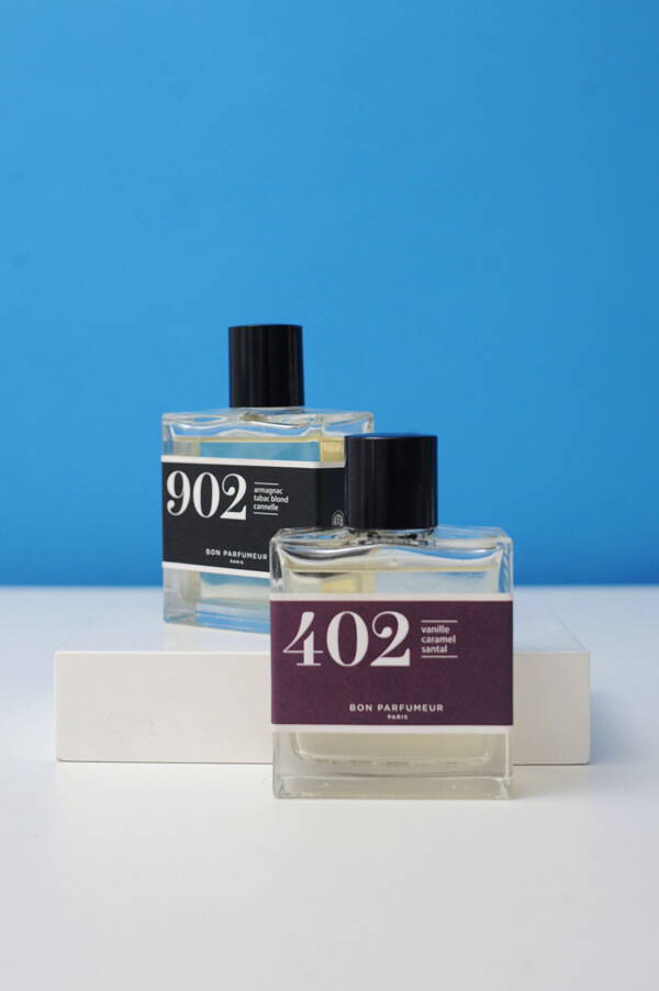 A styled image of Bon Parfumeur 902 and 402 Eau de Parfums.