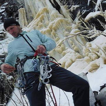 NW Alpine Ambassador Adam Dailey Racking up at Ice Climb