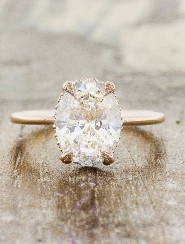 rose gold oval diamond ring with leaf prongs