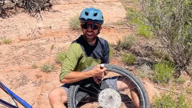 Fixing a flat tire in Moab.