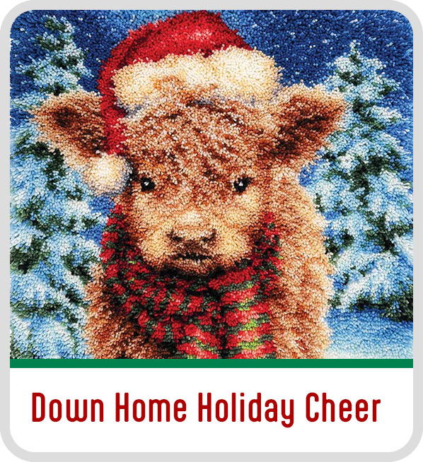 A calf wearing a Santa hat and scarf in a snowy background. Down Home Holiday Cheer