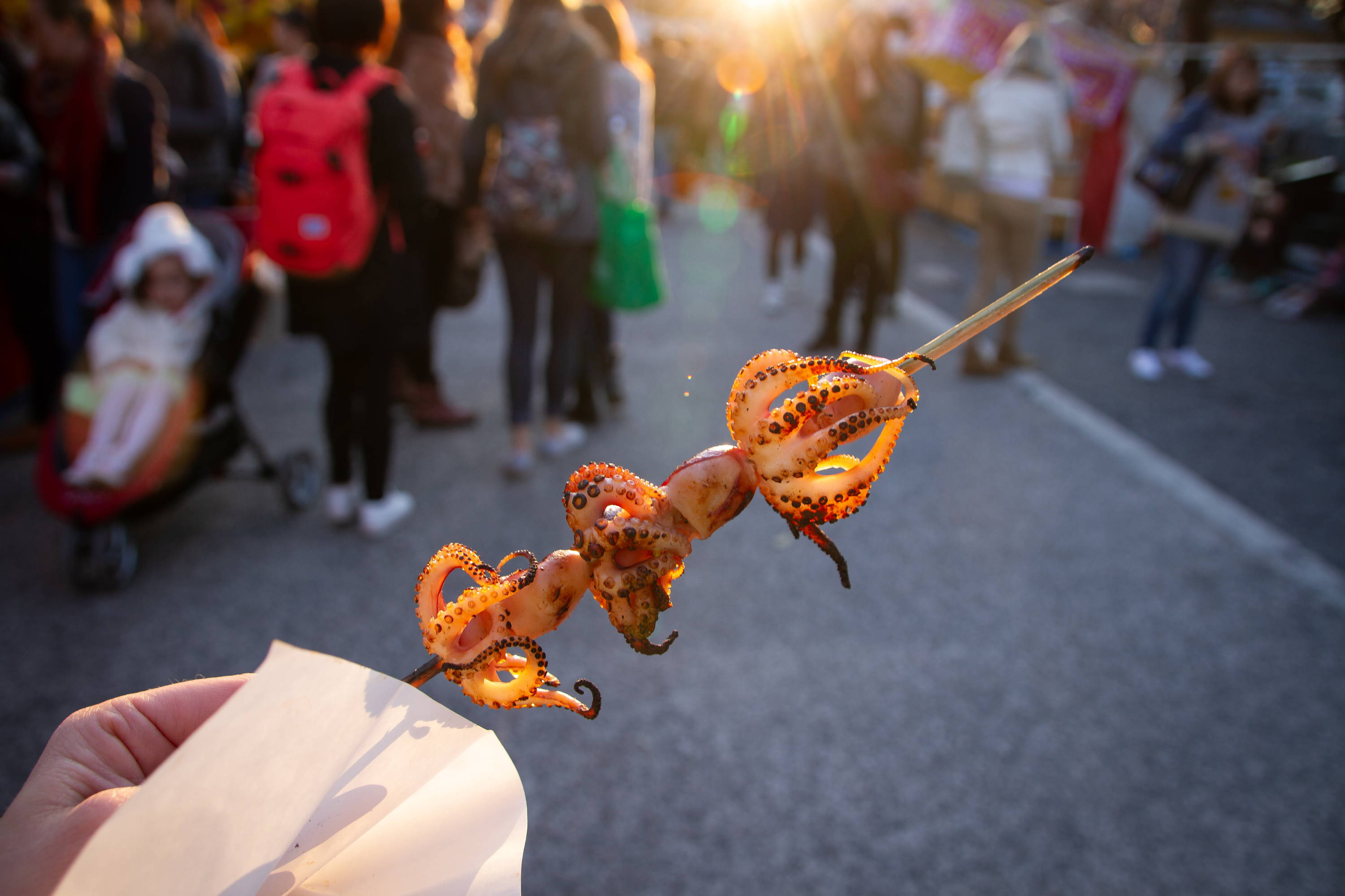 Skewered grilled octopus at a Japanese Festival