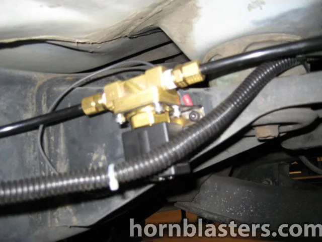 Installed horn assembly detail on Richard's 1997 Ram 1500 photo 13