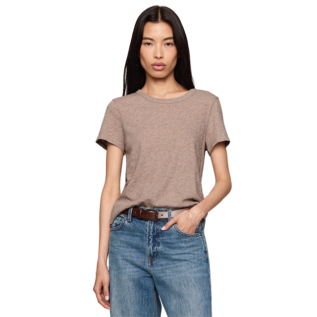 Model wearing a brown t-shirt and blue jeans, standing confidently.