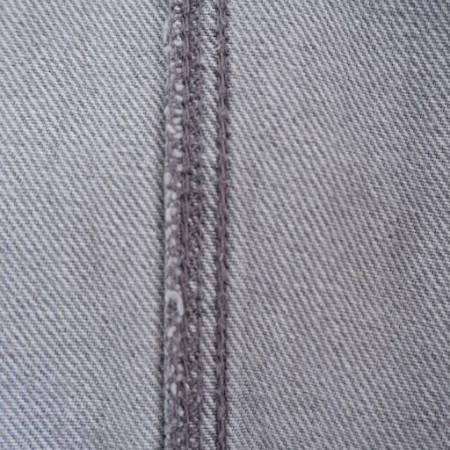 Inside view of a mock flat felled seam of a store bought jeans