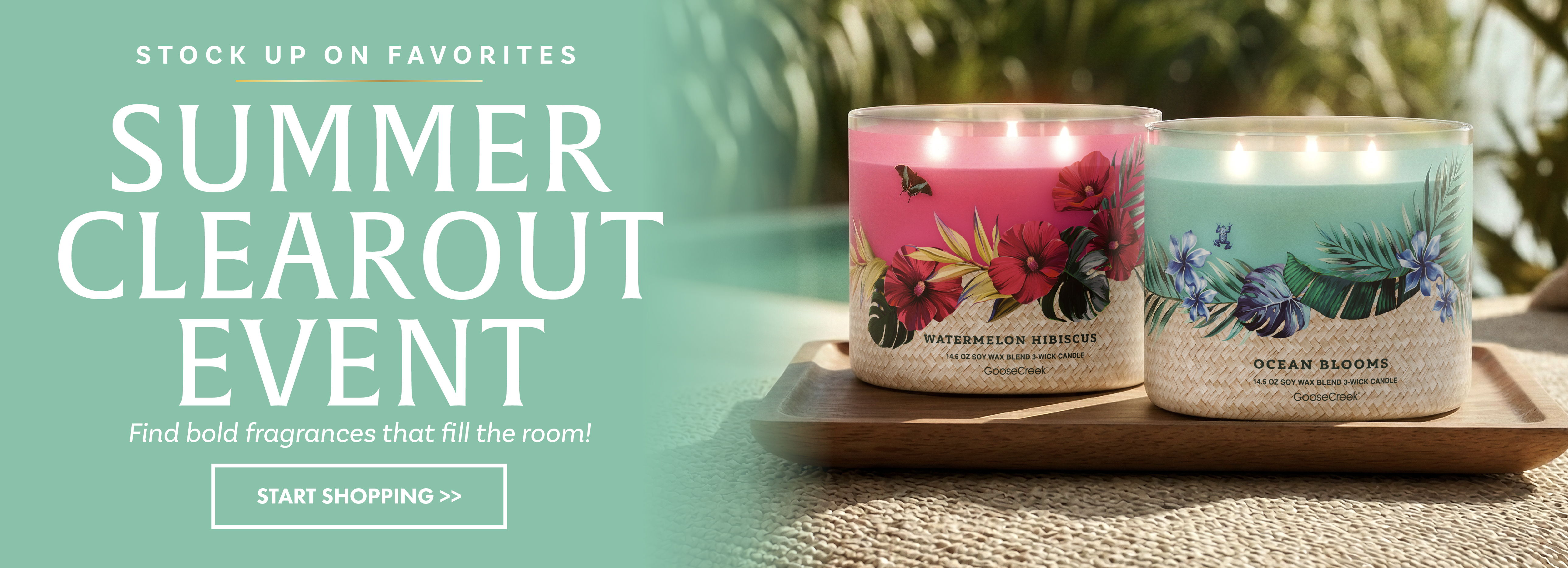Candles displayed for a summer clearout event promotion.