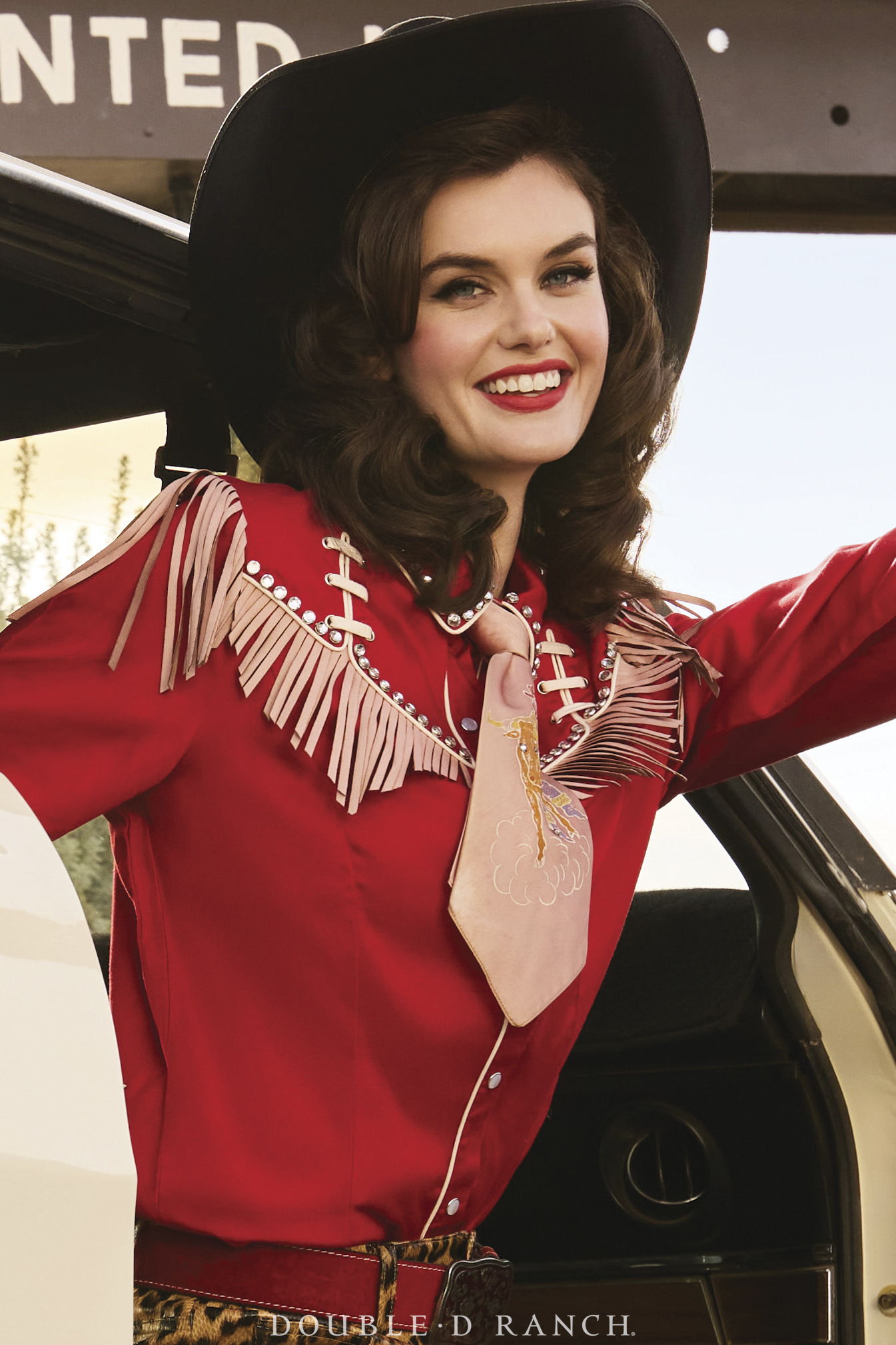 Kaylin wearing the Rodeo Rhinestones Top from the Rhinestone Suits and Cowboy Boots Collection.