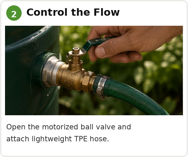 Hand adjusting a motorized ball valve with a green hose attached.