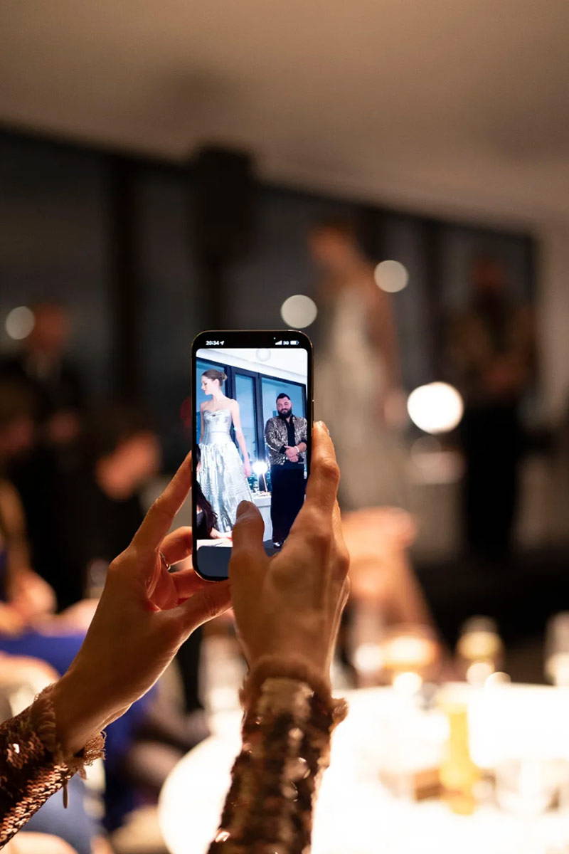 Jimmy Choo The Atelier runway photo of phone taking social media