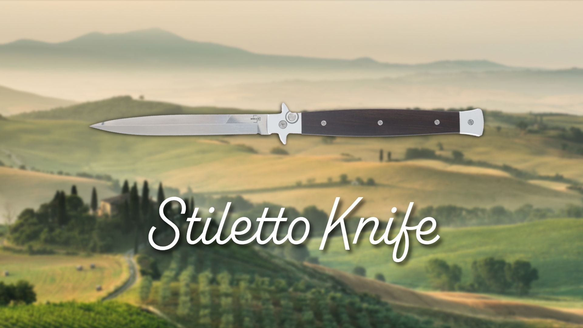 Stiletto knife over a scenic landscape with hills and vineyards.