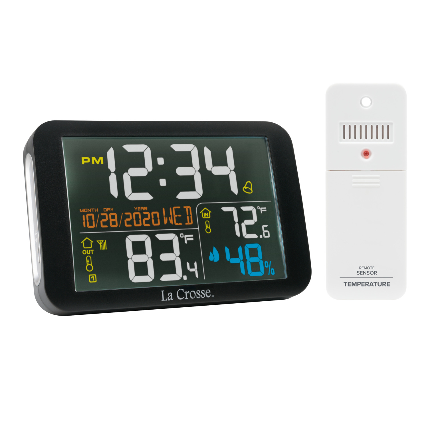 Digital clock and weather station on a wooden surface with tools in background.