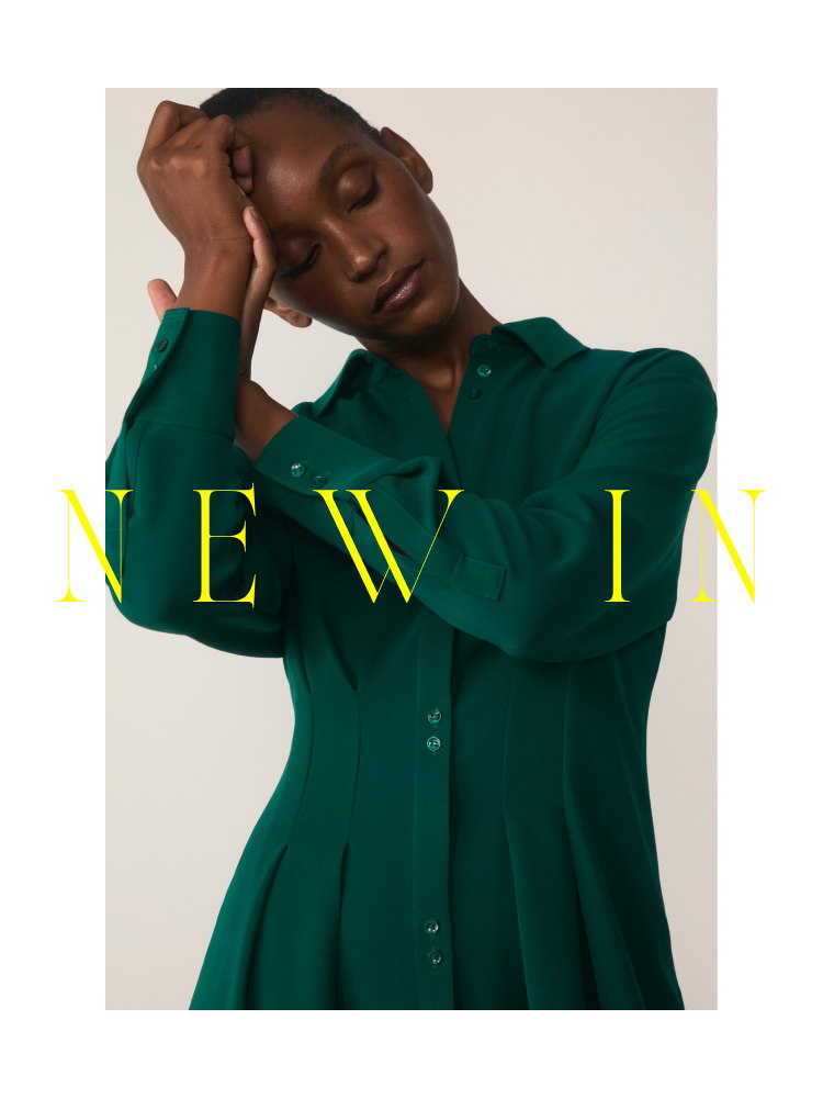 Shop New In - Model wearing Green Amara Crepe dress