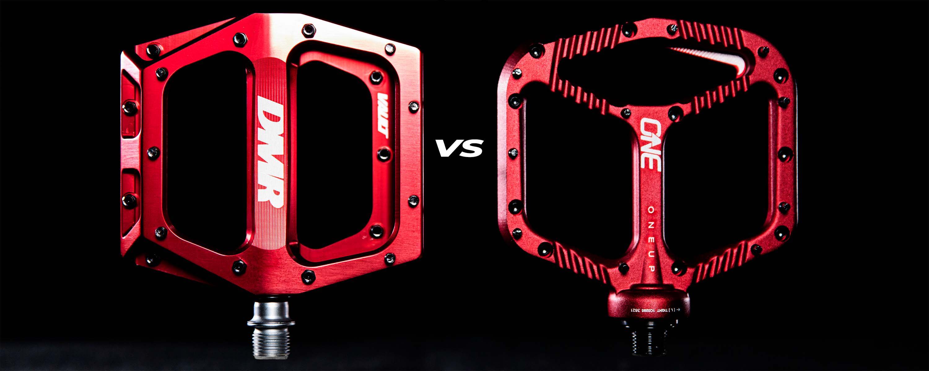 DMR Vault and OneUp Aluminum pedal comparison in red on a black background