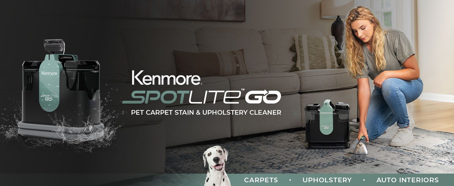 Woman using Kenmore Spotlite Go carpet cleaner on a rug.