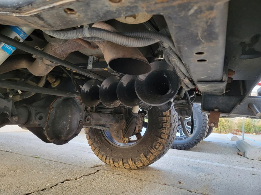Close-up bracket fittings airlines compressor plumbing Conductor's Special 544K Nightmare Edition train horn install detail Chance's 2014 Wrangler Unlimited Rubicon photo 4