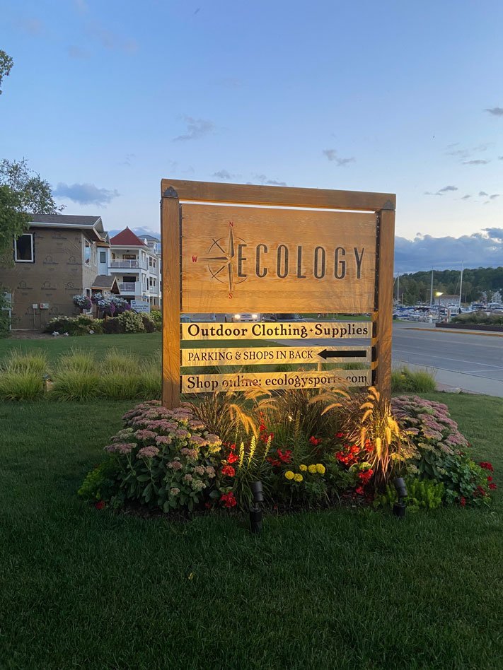 Ecology Sports' beautiful outdoor wooden sign.